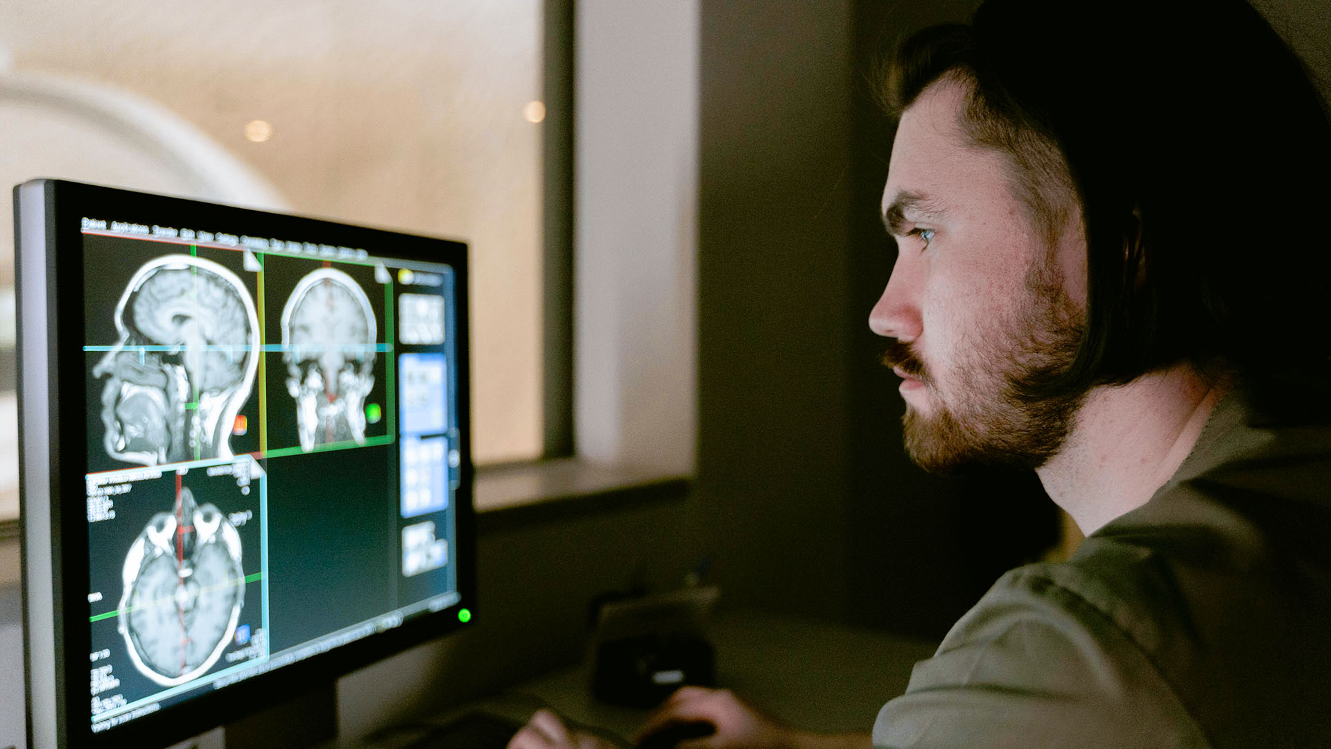 Woman in green shirt about to start her workout