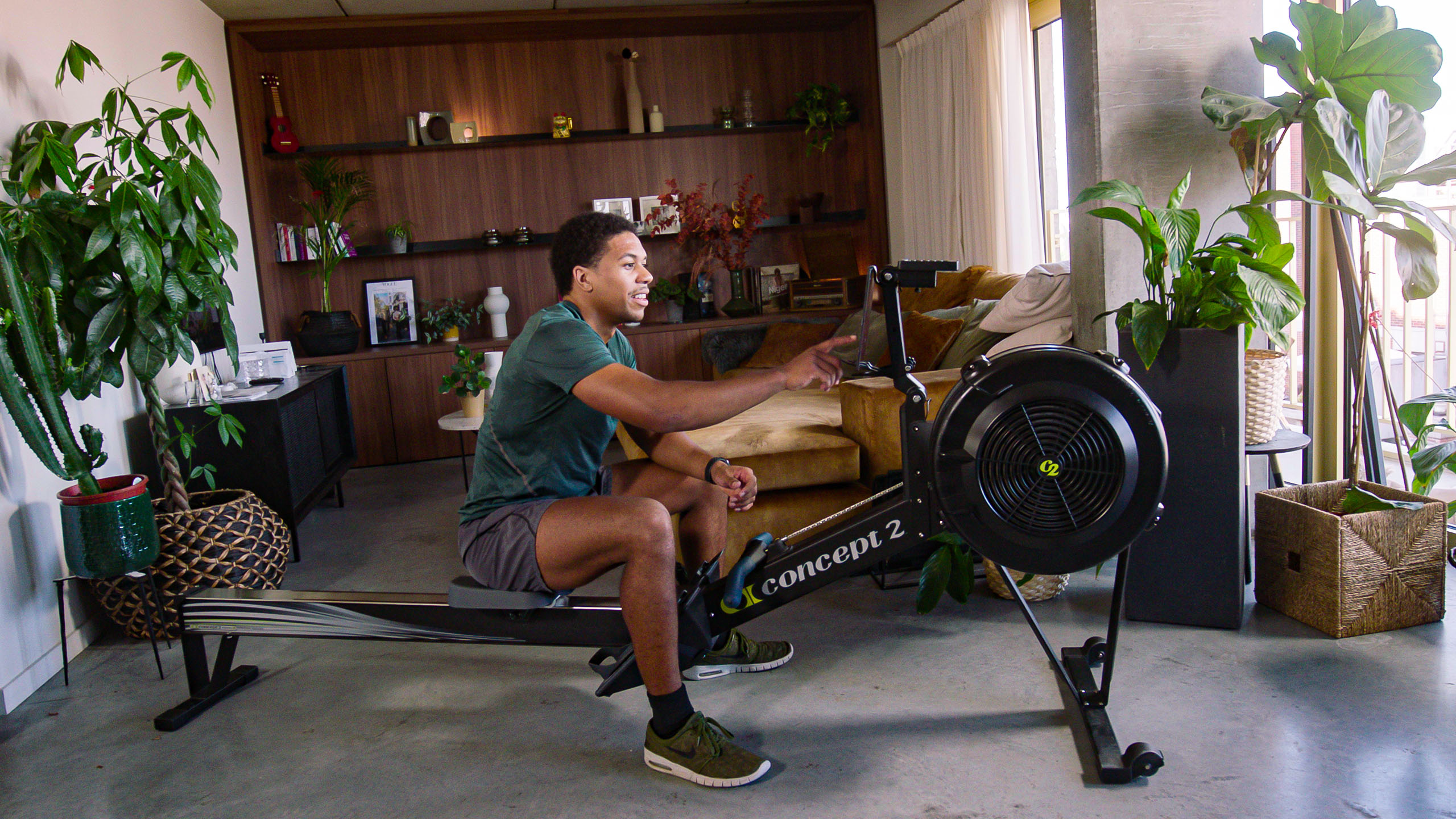 Man on an indoor rowing machine