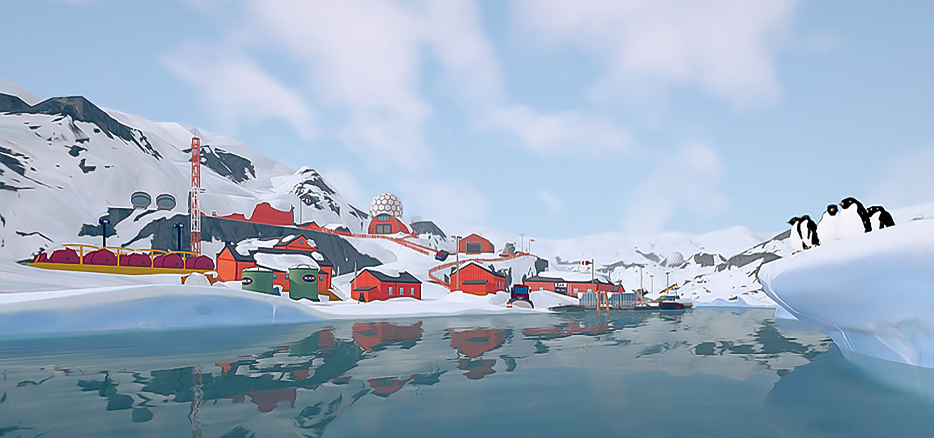 Image of a river side town covered in snow with penguins on the side