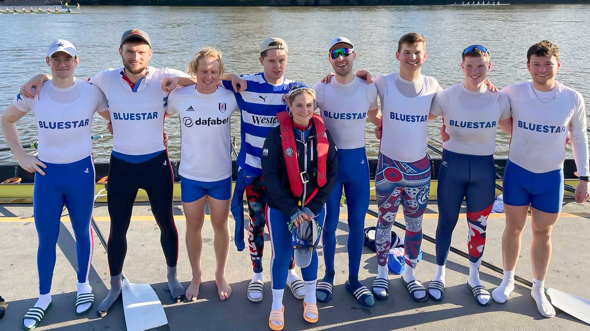 A 9-people rowing crew lining up.