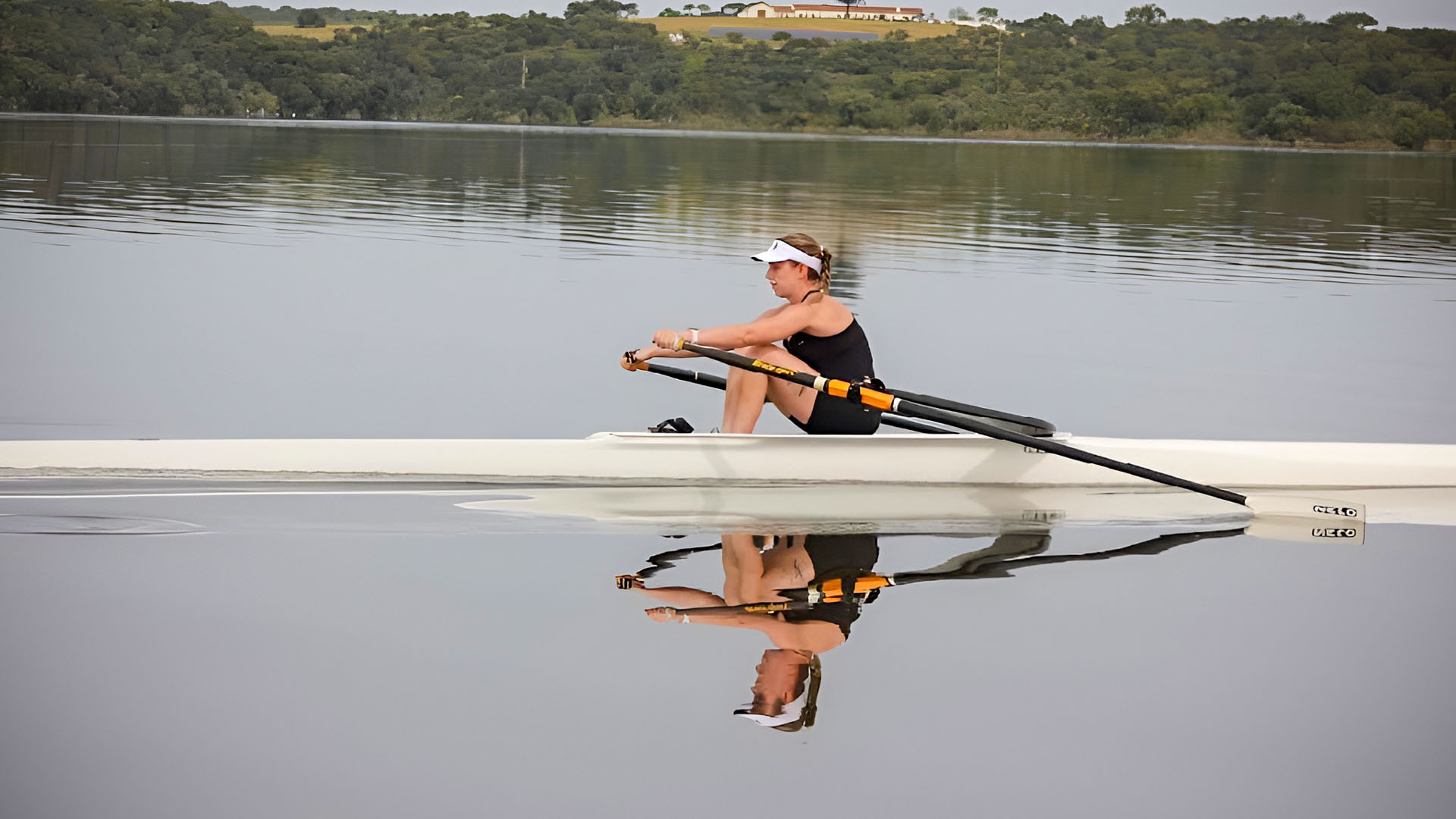 rebekah knight rowing on a lake