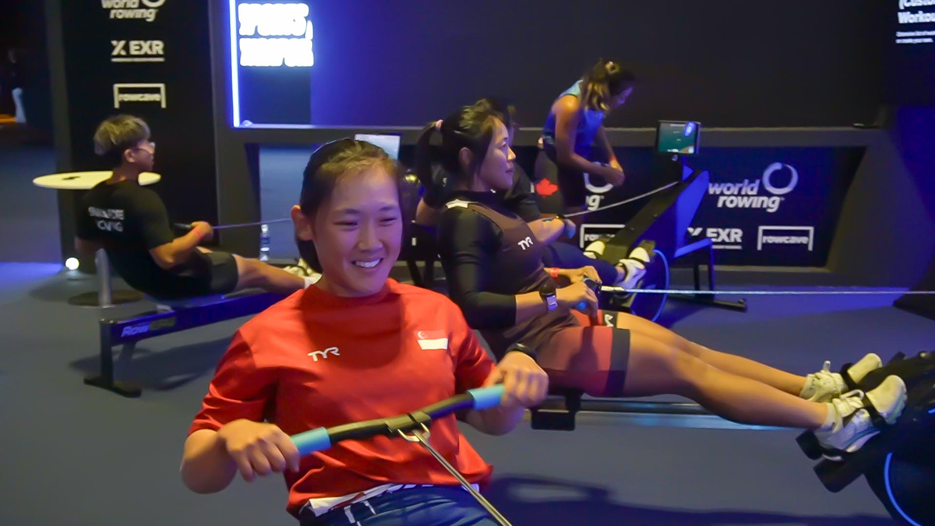 Young people rowing indoor