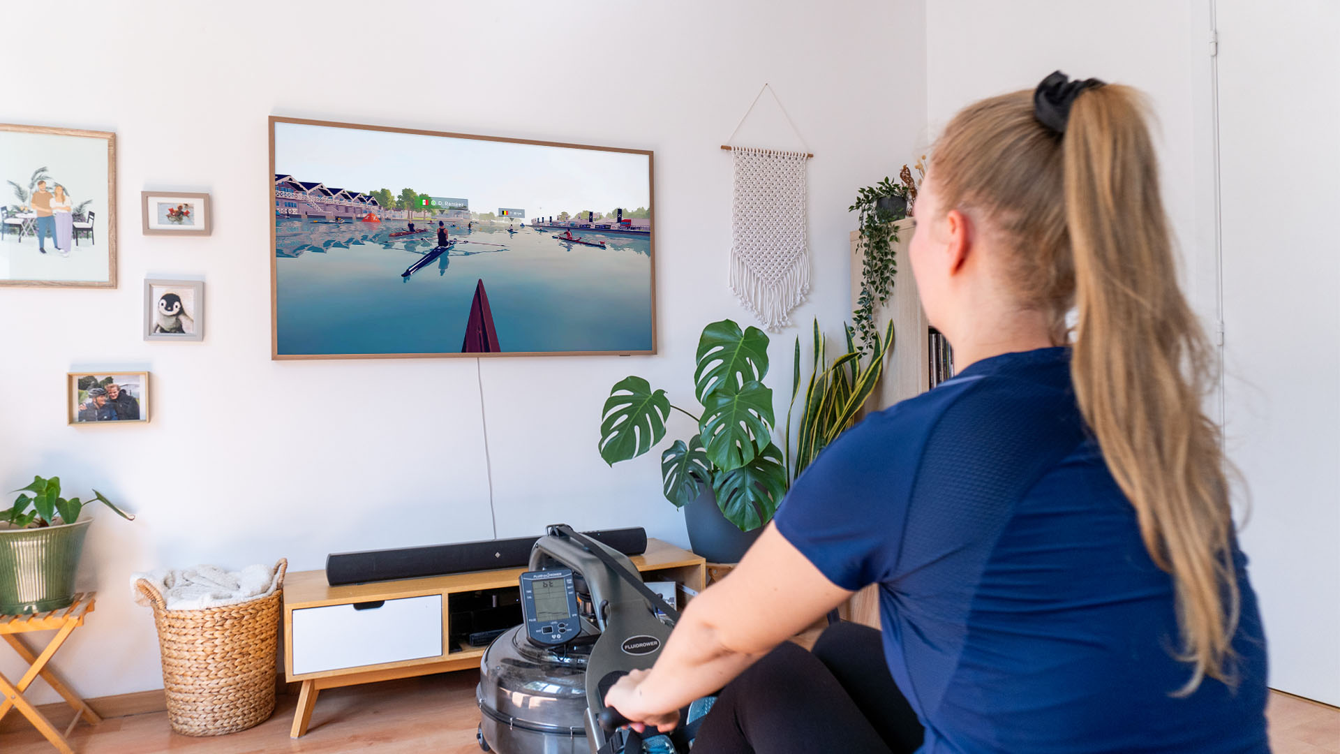 Woman participating in a group row on EXR